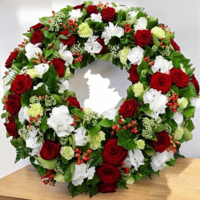 Corona fiorita lutto funerali