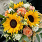 Bouquet di stagione con rose e girasoli