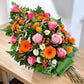 Mazzo lutto di fiori misti colorati