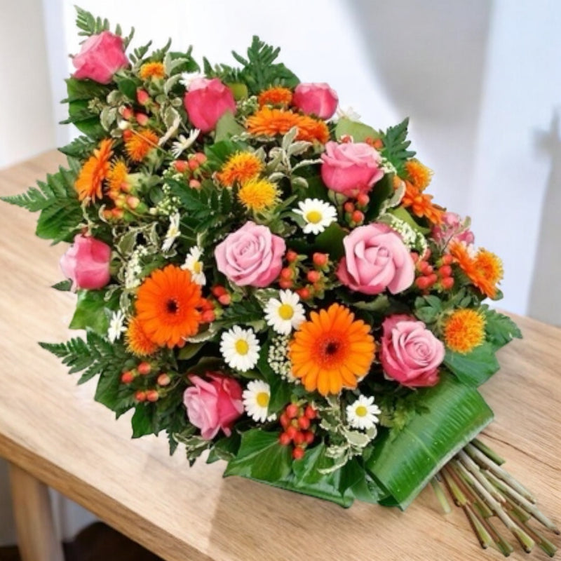 Mazzo lutto di fiori misti colorati