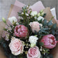 Bouquet autunnale con rose e protese