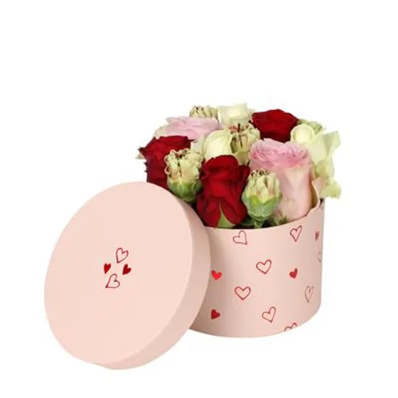 Scatola cilindro basso 14x10h con rose e lisianthus