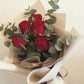 Bouquet San Valentino di 5 rose rosse ed eucalipto