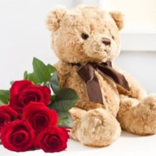 Bouquet di 7 Rose rosse e orsetto di peluches h30 cm