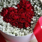 Scatola cilindro con cuore di rose e gipsofila